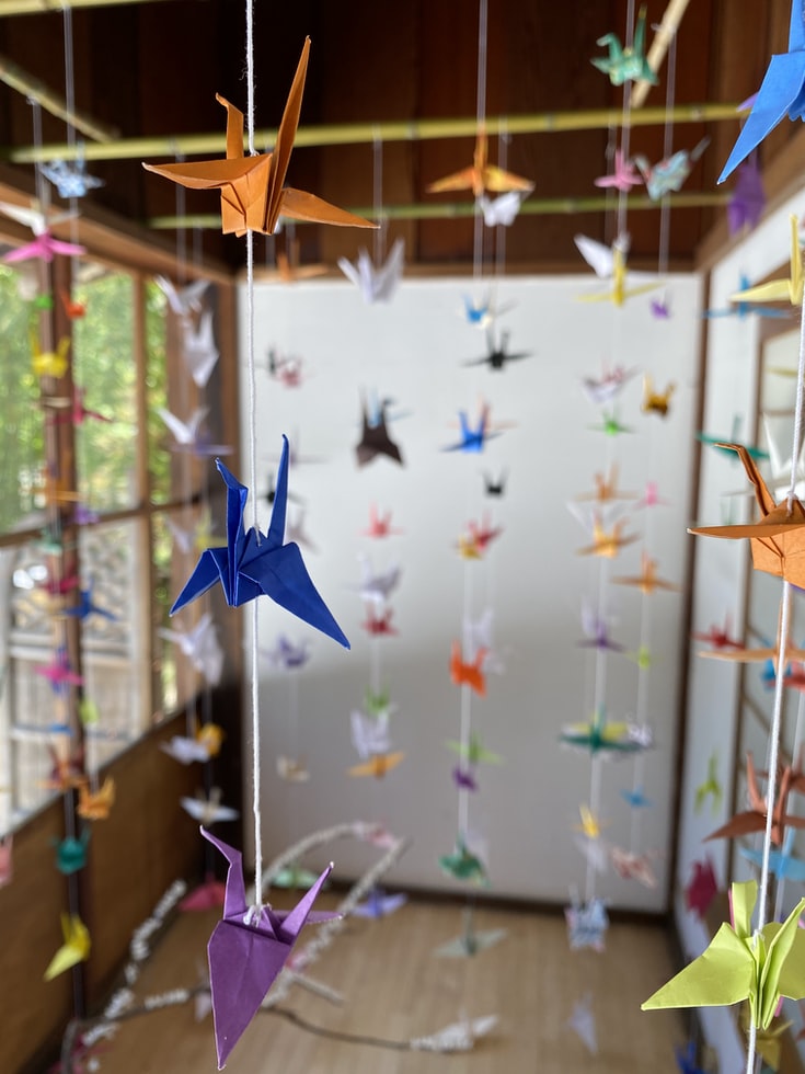 hanging origami birds from ceiling