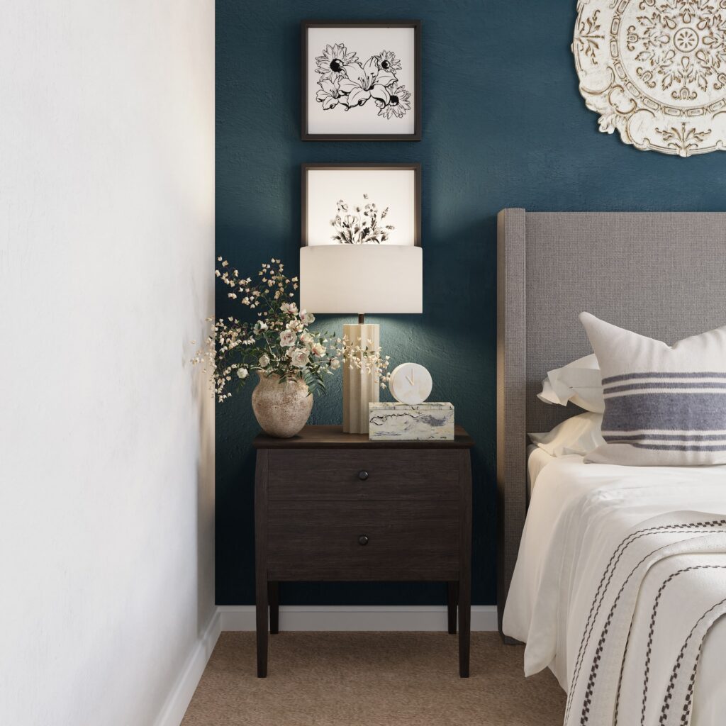 brown nightstand with gray bed