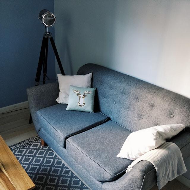 grey couch with espresso furniture