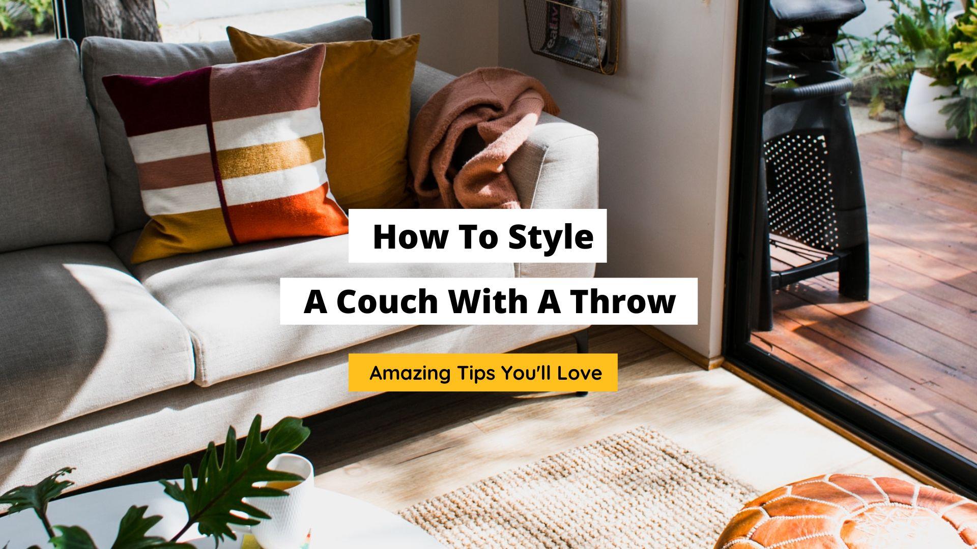 how to style a couch with throw