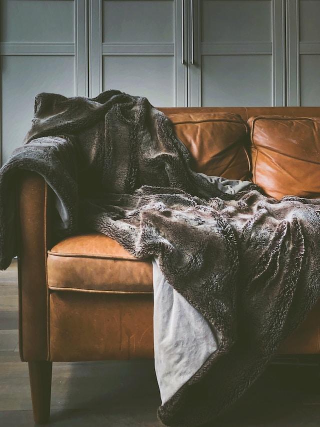 ways to make couch comfortable with throw blanket