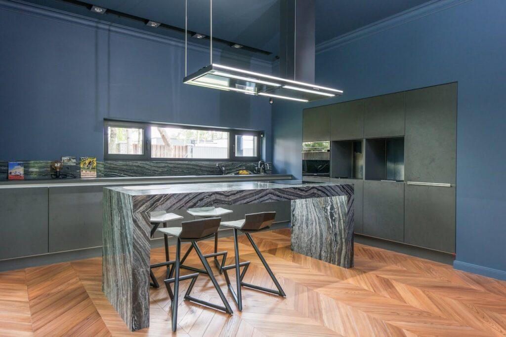 blue kitchen with gray kitchen cabinets
